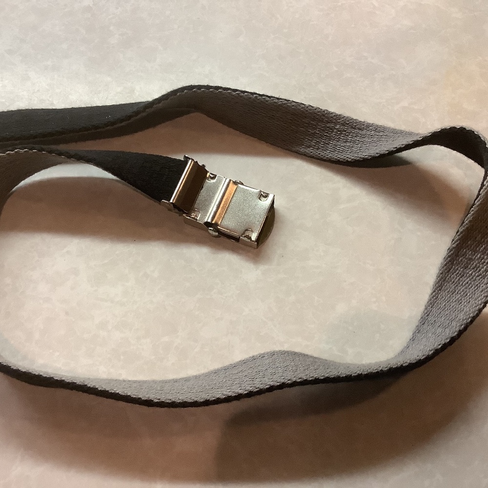 Belt, chrome military style buckle, any size to 32”, reverseable, used but nice